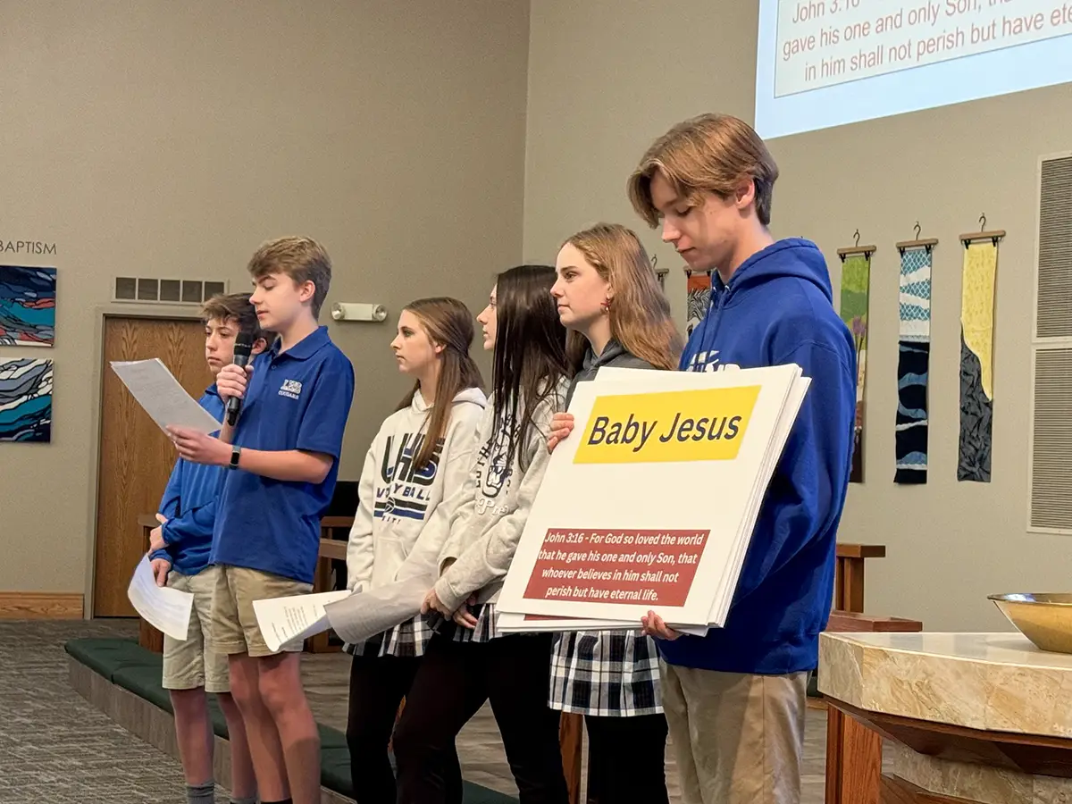 Students giving a presentation in Chapel 